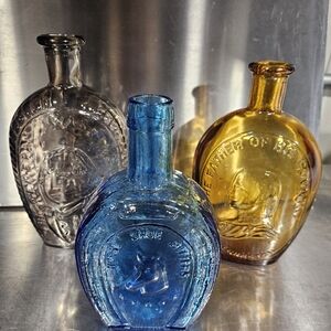 3 Vintage Glass Bottles  in Blue, Amber, and Clear